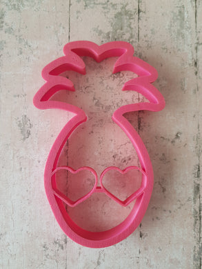 Pineapple with heart glasses