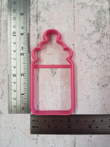 Baby bottle and imprint cutter