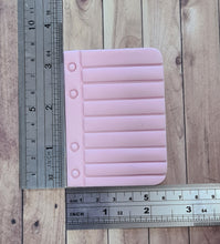 Notebook cutter and imprint